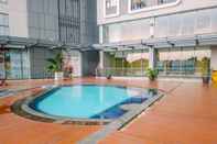 Swimming Pool Comfortable and Nice 2BR Apartment at Royal Olive Residence By Travelio