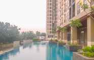 Swimming Pool 6 Best View 2BR Apartment at Transpark Cibubur with Sofa Bed By Travelio