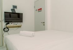 Bedroom 2 Comfy Studio at Apartment Aeropolis Residence By Travelio
