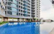 Kolam Renang 5 Cozy and Nice 1BR at Tamansari Iswara Apartment By Travelio