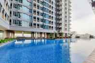 Swimming Pool Cozy and Nice 1BR at Tamansari Iswara Apartment By Travelio