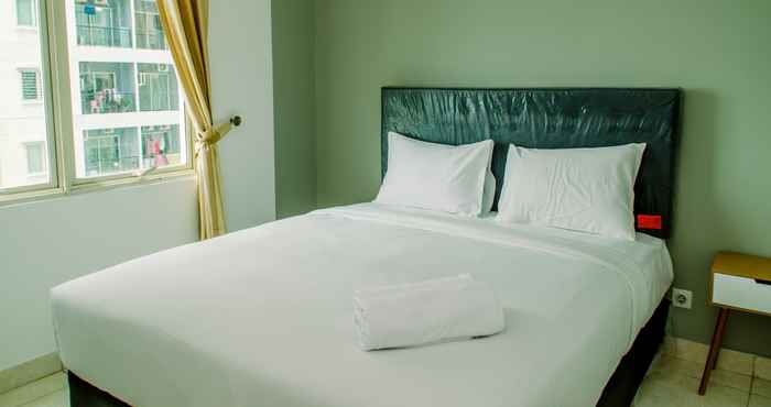 Kamar Tidur Elegant and Comfort 2BR at City Home MOI Apartment By Travelio