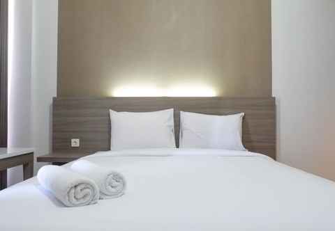 Bedroom Stylish Living Studio at Apartment Taman Melati Surabaya By Travelio
