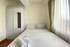 卧室 Well Appointed 1BR Apartment at Harvard Jatinangor By Travelio