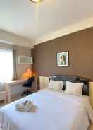 BEDROOM Affordable Room Studio Pool View Pinewood Jatinangor Apartment By Travelio