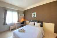 Bedroom Affordable Room Studio Pool View Pinewood Jatinangor Apartment By Travelio