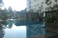 Swimming Pool Affordable Room Studio Pool View Pinewood Jatinangor Apartment By Travelio