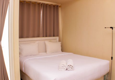Phòng ngủ Comfort Room Studio at Oasis Cikarang Apartment By Travelio