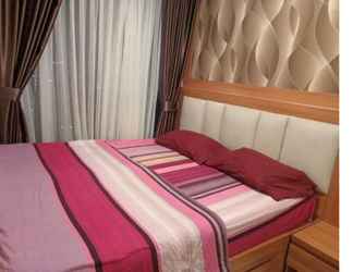 Kamar Tidur 2 Apartemen Mahogani by Dewi Rooms