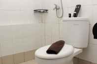 Toilet Kamar Restful and Comfort 2BR at Bassura City Apartment By Travelio