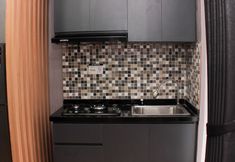 Common Space 4 Restful and Comfort 2BR at Bassura City Apartment By Travelio