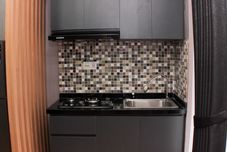 Common Space Restful and Comfort 2BR at Bassura City Apartment By Travelio