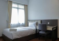 Bedroom 2 Modern 3BR at Simprug Park Residences By Travelio Premium