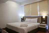 ห้องนอน Comfort 2BR at Simprug Park Residences By Travelio Premium