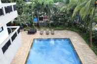 Swimming Pool Comfort 2BR at Simprug Park Residences By Travelio Premium