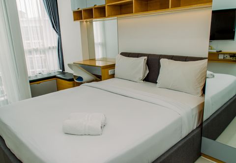 Bedroom Elegant Studio at Pacific Garden Apartment near Alam Sutera By Travelio