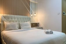 ห้องนอน Cozy and Well Appointed Studio at West Vista Apartment By Travelio