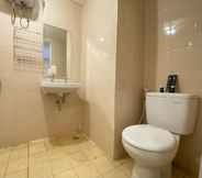 In-room Bathroom 4 Private Classic 1BR Apartment at Parahyangan Residence Bandung By Travelio