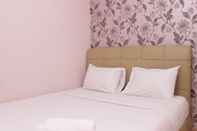 Bedroom Homey and Warm 2BR at Springlake Summarecon Bekasi Apartment By Travelio
