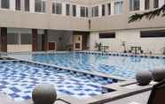 Swimming Pool 5 Cozy Studio at Apartment Emerald Towers By Travelio