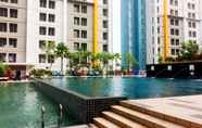 Swimming Pool 5 Cozy Stay Studio Apartment at Paramount Skyline By Travelio