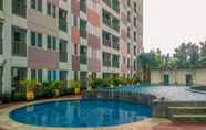 Kolam Renang 7 Warm and Cozy Studio at Grand Sentraland Karawang Apartment By Travelio