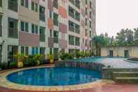 Swimming Pool Warm and Cozy Studio at Grand Sentraland Karawang Apartment By Travelio