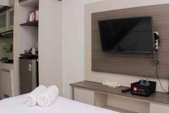 Bedroom 4 Warm and Cozy Studio at Grand Sentraland Karawang Apartment By Travelio