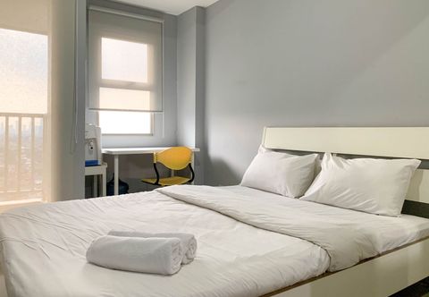 Bedroom Tranquil Living Studio Apartment at Belmont Residence Puri By Travelio