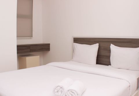 寝室 Cozy Stay and Warm Studio Urbantown Karawang Apartment By Travelio