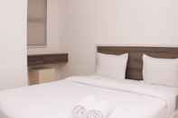 Kamar Tidur Cozy Stay and Warm Studio Urbantown Karawang Apartment By Travelio