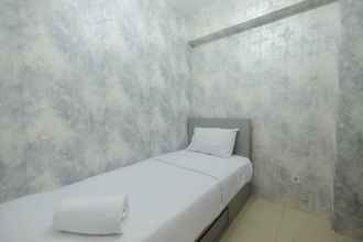 Bedroom 4 Restful and Strategic 2BR at Bassura City Apartment By Travelio