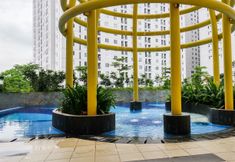 Swimming Pool 7 Restful and Strategic 2BR at Bassura City Apartment By Travelio