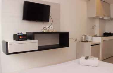 Lobi 2 Cozy Living and Tidy Studio at Urbantown Apartment Karawang By Travelio