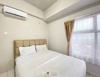 Bedroom 2 Homey and Spacious 2BR Apartment at Newton Residence By Travelio