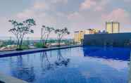 Swimming Pool 6 Tidy and Best Deal Studio at Evenciio Margonda Apartment By Travelio