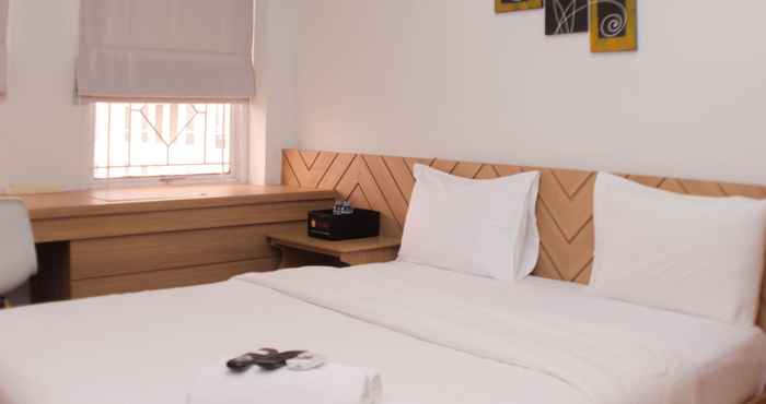 Kamar Tidur Cozy Stay and Homey Studio Apartment at Patraland Urbano By Travelio