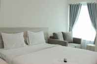 Bedroom Comfy and Elegant Studio at Grand Kamala Lagoon Apartment By Travelio