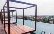 Swimming Pool 7 Comfy and Elegant Studio at Grand Kamala Lagoon Apartment By Travelio