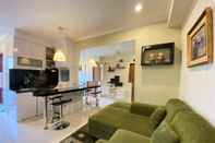 Common Space Cozy and Warm 2BR Apartment at Gateway Ahmad Yani Cicadas By Travelio