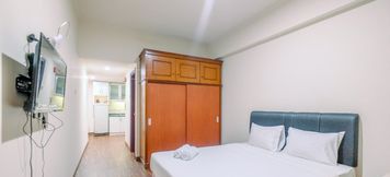 Bedroom 2 Simply and Comfort Studio at Puri Kemayoran Apartment By Travelio