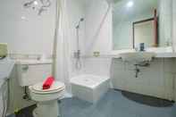 In-room Bathroom Simply and Comfort Studio at Puri Kemayoran Apartment By Travelio