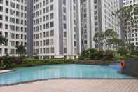 Kolam Renang Nice and Fancy 2BR Apartment at M-Town Residence By Travelio