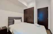 Bedroom 2 Spacious and Tidy 2BR at Branz BSD Apartment By Travelio