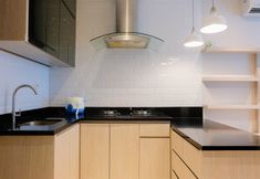 Bedroom 4 Chic and Tidy 1BR Brooklyn Apartment near IKEA Alam Sutera By Travelio