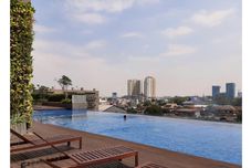 スイミングプール Apartemen Springwood by Royal Room