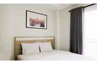 Bedroom Apartemen Springwood by Royal Room