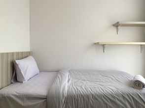 Kamar Tidur 4 Tidy and Cozy Living 2BR Ciputra World 2 Apartment By Travelio Premium