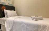 Kamar Tidur 2 Nice and Comfort 2BR at The Mansion Kemayoran Apartment By Travelio