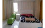 Kamar Tidur 4 Apartment Cibubur Village by Merlyn Rooms